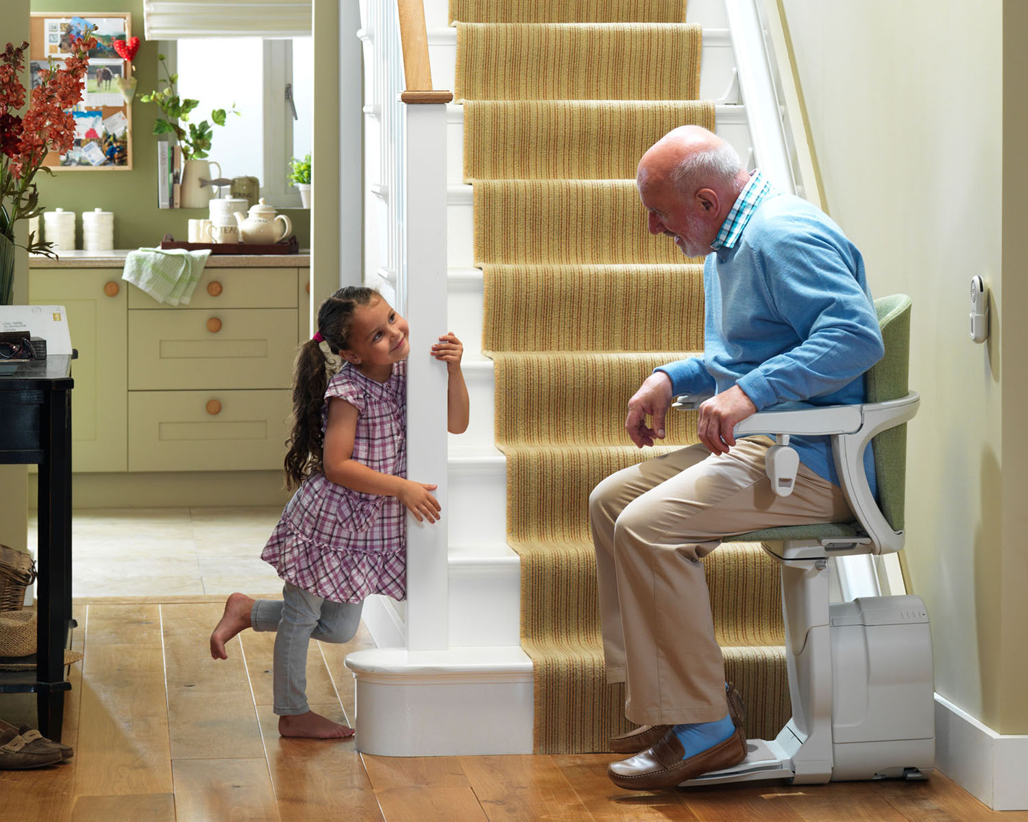 Residential stair lift installed on an indoor staircase